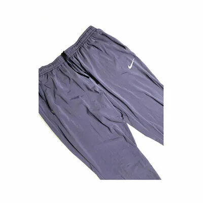 Nike Women's Thermal Essential Woven Jogger Pants Purple